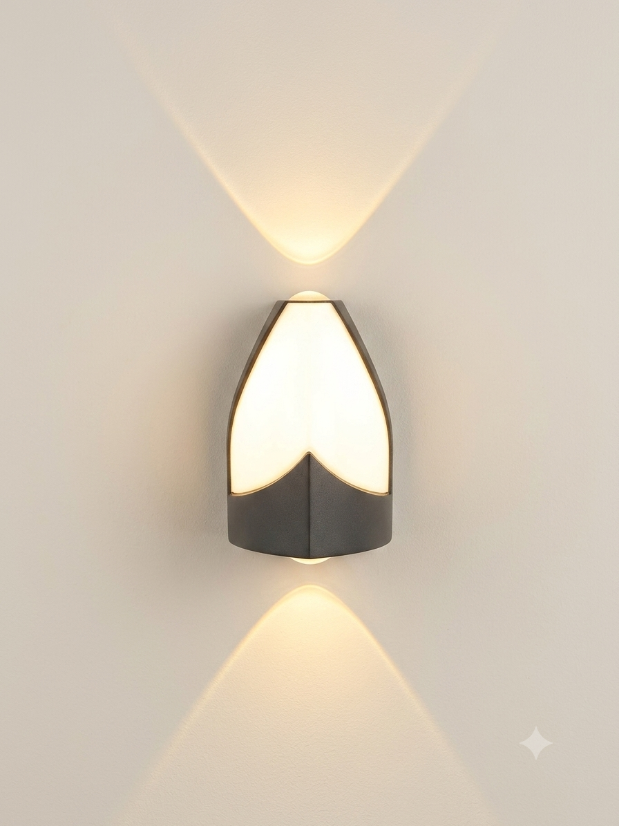 A modern wall lamp (sconcealer) with a design that combines sharp metal lines and soft curves, distributing symmetrical light up and down to form an attractive light pattern on the wall.