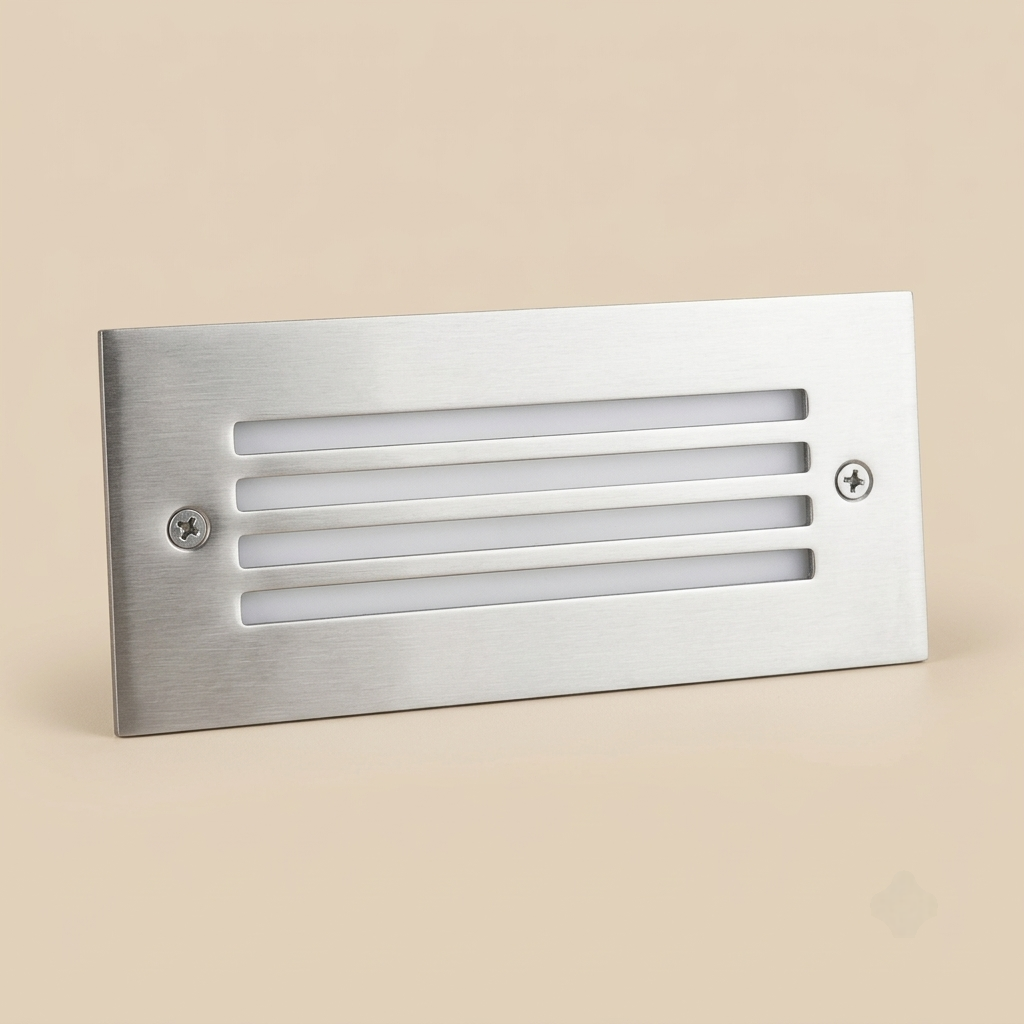 Flush-mount stainless steel step light with slotted grille